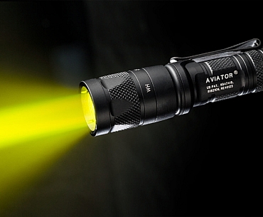 SureFire Aviator flashlight with yellow-green